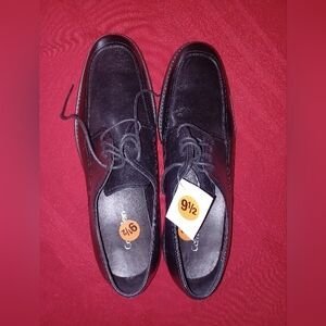 New Calvin Klein men's black leather dress shoes in a size 9 ½